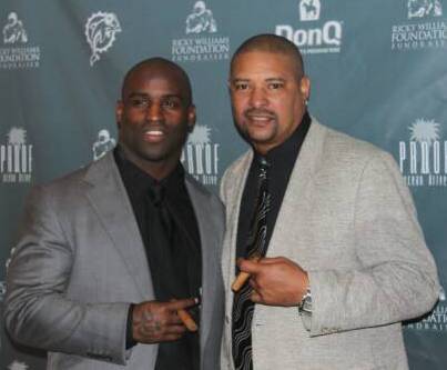 Ricky Williams and Walter Briggs at a charity event